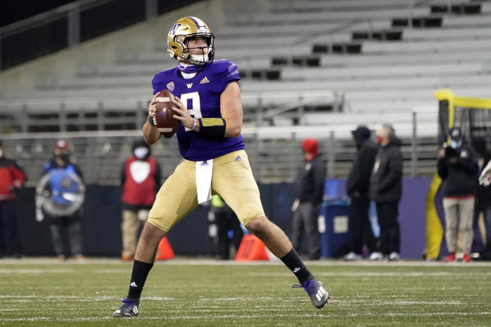 Washington quarterback Dylan Morris drops back to pass against Utah during the second half of an NCAA college football game Saturday, Nov. 28, 2020, in Seattle. (AP Photo/Ted S. Warren)