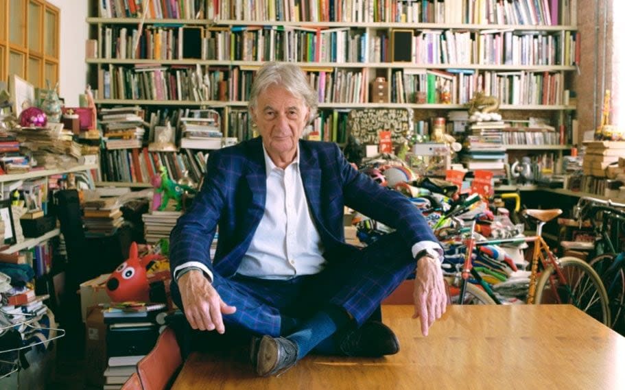 Paul Smith, surrounded by his precious books and objects, at his central London HQ - Ben Murphy