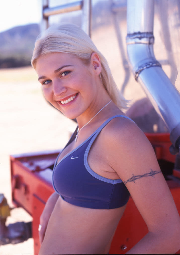 closeup of jo leaning against a truck