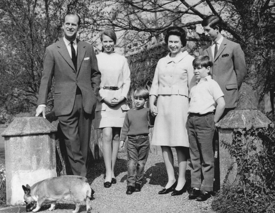 FILE - The Royal family pose for a photo at Frogmore, in Windsor, England, April 1968, to celebrate the 42nd birthday of Britain's Queen Elizabeth II, From right is Prince Philip, the Duke of Edinburgh, her husband, Princess Anne, Price Edward, The Queen , Prince Andrew and Prince Charles. Queen Elizabeth II will mark 70 years on the throne Sunday, Feb. 6, 2022 an unprecedented reign that has made her a symbol of stability as the United Kingdom navigated an age of uncertainty. (AP Photo, File)