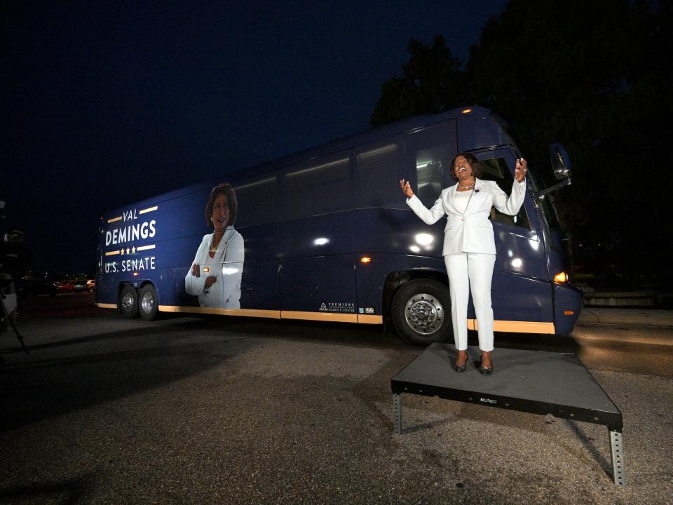 Rep. Val Demings, Democratic candidate for the US Senate, addresses supporters outside her campaign bus during a primary election party on Tuesday, August 23, 2022, in Orlando, Florida.