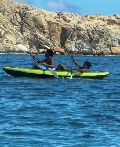 <p>Kimora Lee Simmons/Instagram</p> Kimora Lee Simmon's sons kayak during their tropical Christmas vacation