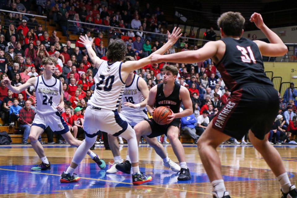 NorthWood's Cade Brenner (3) navigates down the lane during the IHSAA Semistate Saturday, Mar. 18, 2023 at North Side Gym in Elkhart.