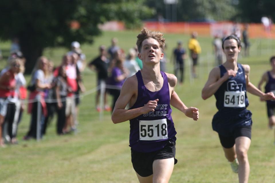 Mount Gilead's Will Baker runs to the finish line during the Division III boys race at the Galion Cross Country Festival on Saturday.