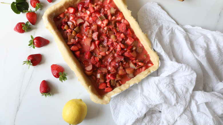 Strawberry rhubarb pie with strawberries