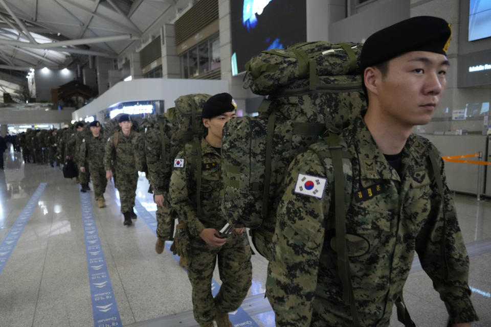 South Korean army soldiers arrive to board a plane to leave for quake-ravaged Turkey at the Incheon International Airport in Incheon, South Korea, Tuesday, Feb. 7, 2023. (AP Photo/(AP Photo/Ahn Young-joon)