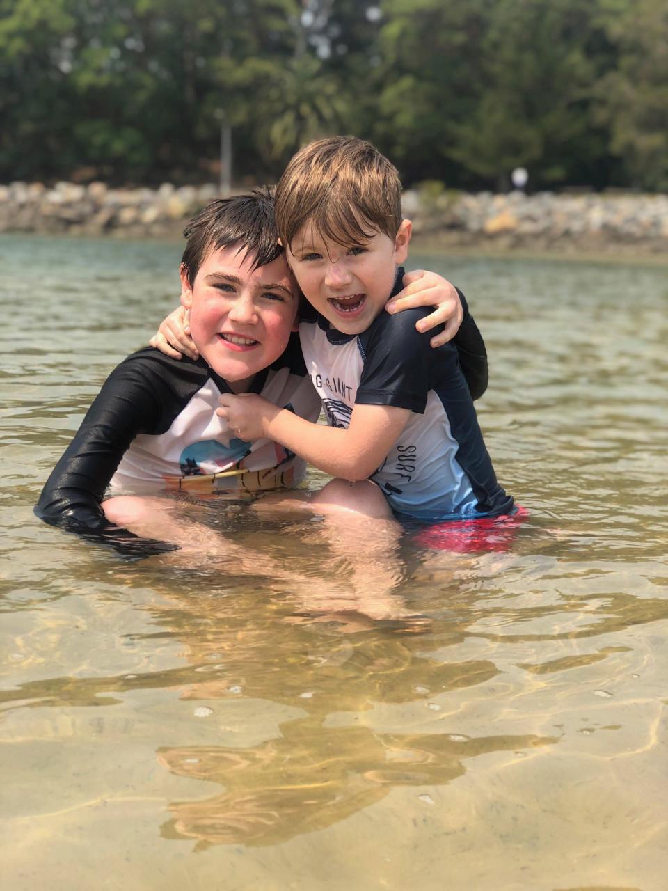 Pictured is Riley (left) and Tarek swimming, which mother Vanessa Brown says is the best form of exercise for them.