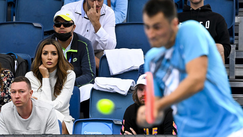 Vanessa Sierra, pictured here watching Bernard Tomic against Yuichi Sugita at the Australian Open. 