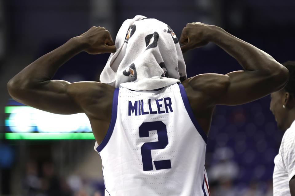 TCU forward Emanuel Miller (2) reacts after a TCU scored a 3-pointer against Louisiana-Monroe during the second half of an NCAA college basketball game Thursday, Nov. 17, 2022, in Fort Worth, Texas. (AP Photo/Ron Jenkins)