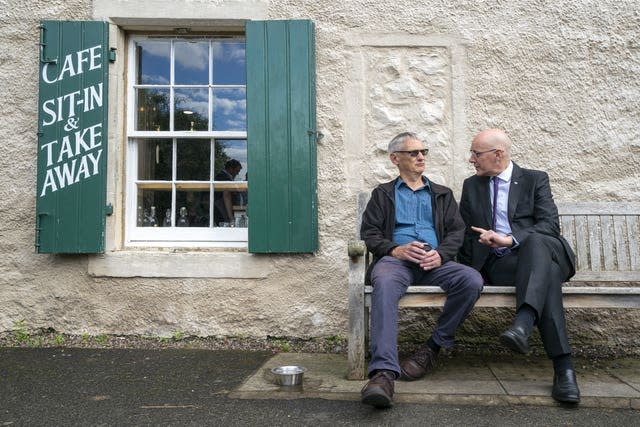 John Swinney makes a pitch to a voter