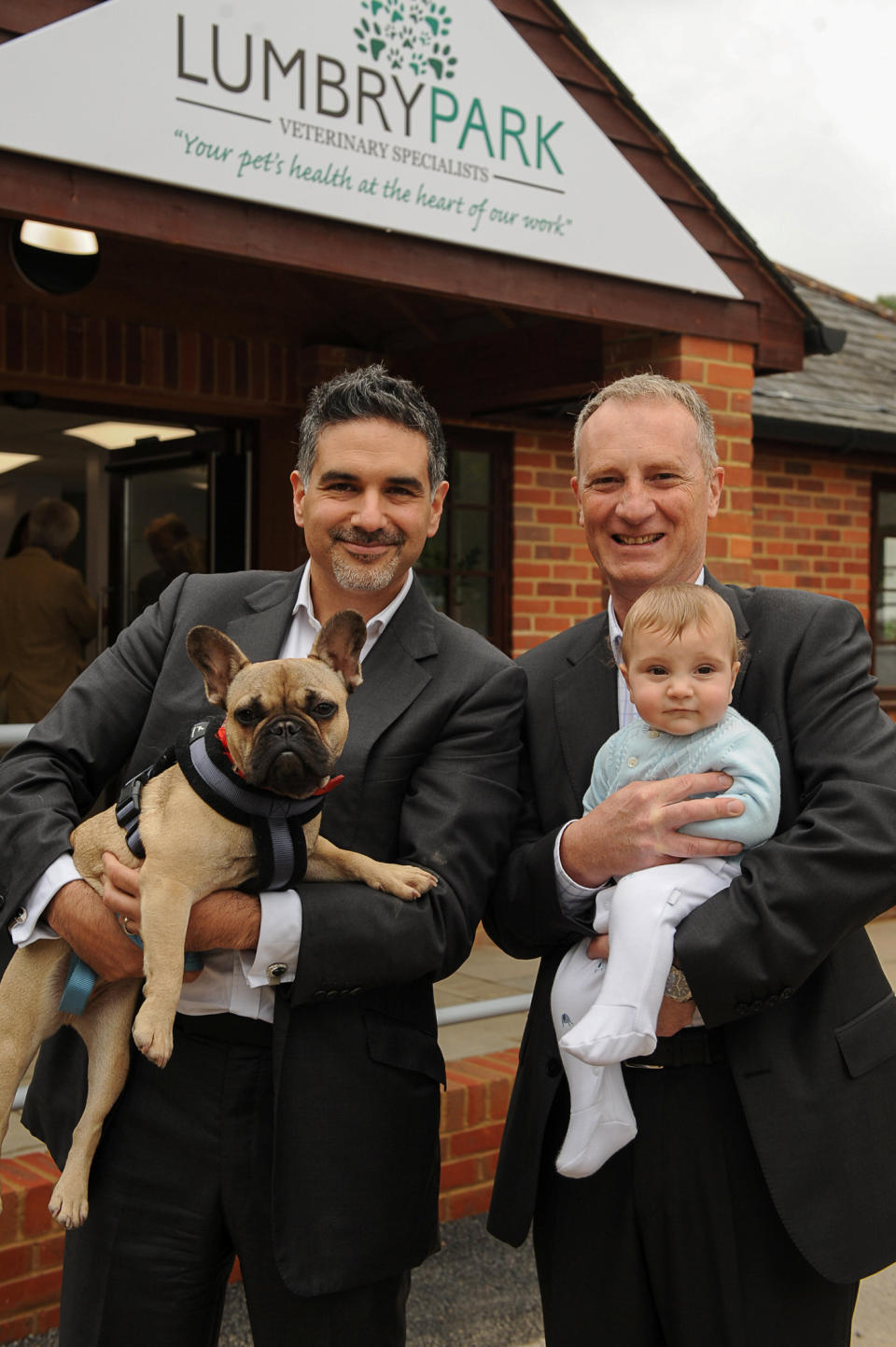 Dr Caner and Budu with Luca and Mattia. See SWNS story SWOCheart; The vet parents of a tot saved by a heart operation returned the favour by curing the same condition - suffered by the hero doctor's pet dog. Mattia Ferasin, now four, was born with a hole in his heart and needed a seven-hour operation to save his life. One of the cardiac surgeons on the team - Dr Caner Salih - revealed his French bulldog Budu was also struggling with a heart problem - and was remarkably diagnosed with the same heart condition at the same time as Mattia's vet dad. And when Mattia's parents Luca and Heidi - both veterinary cardiologists - found out, they offered to treat the pooch and nurse him back to health. Now Budu and Mattia have both made a full recovery, and are the best of friends. Heidi, 38, from Four Marks, Hampshire, said: "We are forever indebted to the whole team of doctors who helped Mattia.