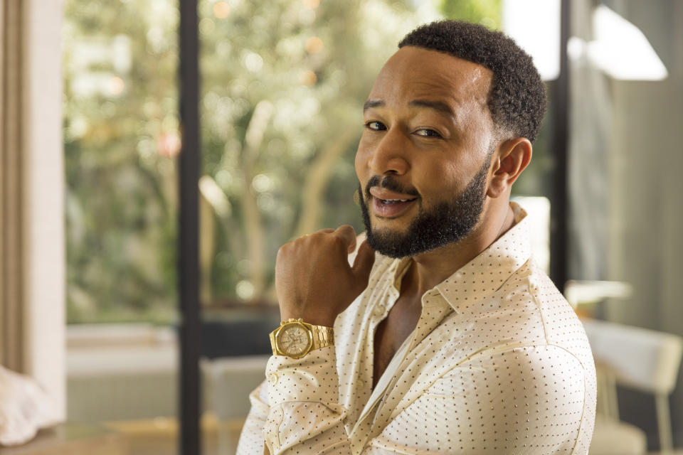 John Legend poses for a portrait on Monday, Aug. 15, 2022, in West Hollywood, Calif., to promote his latest double album "Legend." (Photo by Willy Sanjuan/Invision/AP)