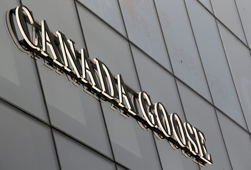 A sign of Canada Goose is pictured outside its store in Beijing's Sanlitun area