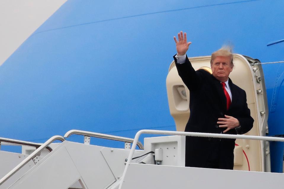 President Donald Trump boards Air Force One as he leaves Andrews Air Force Base in Maryland on Monday, Feb. 11, 2019, for a trip to El Paso. Trump will hold his first campaign rally since November's midterm elections in El Paso as he faces a defining week for his push for a border wall, his presidency and his 2020 prospects.