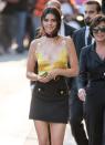 <p>This yellow cami and military skirt look is just so beautiful. [Photo: Getty] </p>