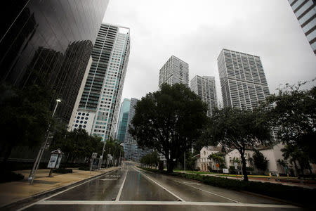 An empty street is seen in downtown Miami before the arrival of Hurricane Irma to south Florida, September 9, 2017. REUTERS/Carlos Barria