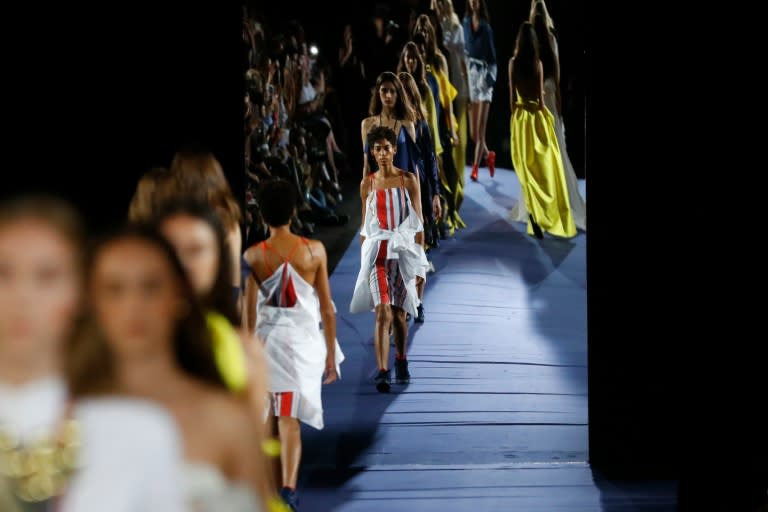 Models present creations for Alexis Mabille during the 2017 Spring/Summer ready-to-wear collection fashion show in Paris on September 29, 2016