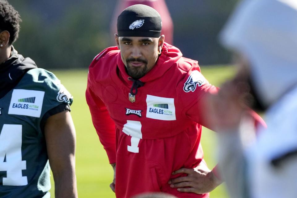 Philadelphia Eagles quarterback Jalen Hurts stretches during a team practice session on Wednesday.