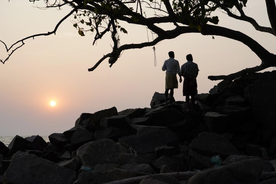 The sun sets along the Arabian Sea in Kochi, Kerala state, India, March 4, 2023. Tens of millions of people in India live along coastlines and thus are exposed to major weather events. (AP Photo)