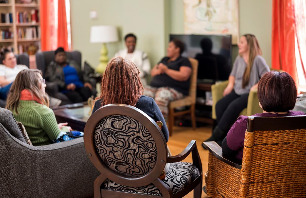 Women gather for a residential meeting at a home in the Thistle Farms network. [Thistle Farms]
