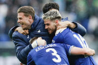 Hoffenheim's Anton Stach, right, celebrates scoring their side's fourth goal of the game during the Bundesliga soccer match between TSG 1899 Hoffenheim and Borussia Mönchengladbach at PreZero Arena in Sinsheim, Germany, Saturday April 20, 2024. (Uwe Anspach/dpa via AP)