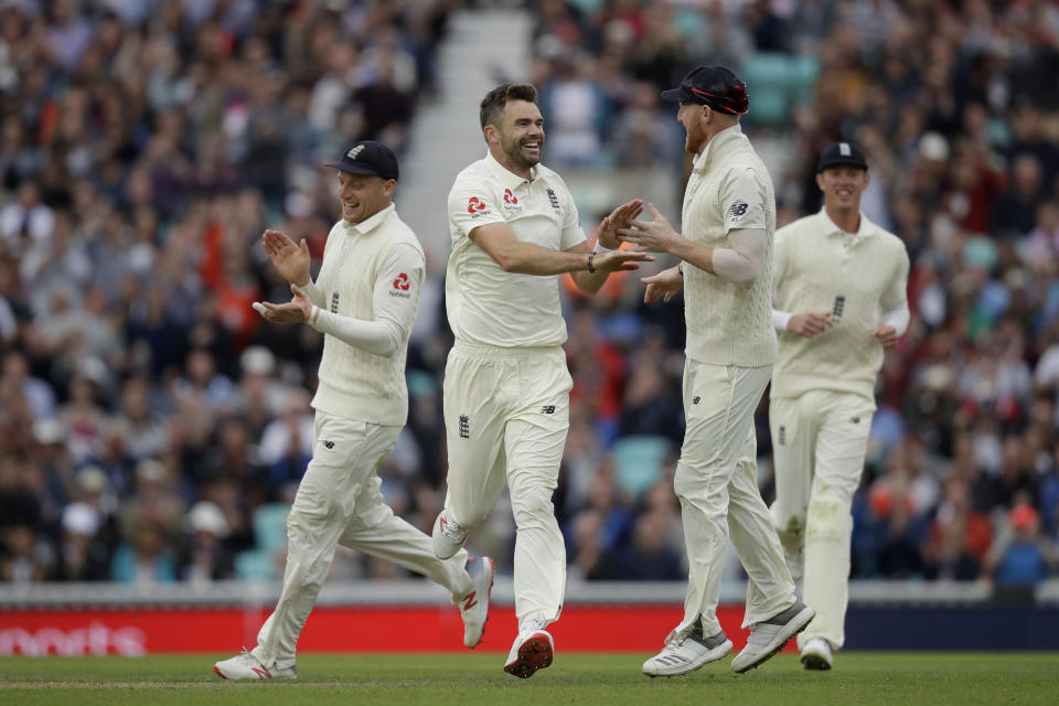 England's Jimmy Anderson, second left, celebrates taking the wicket of India's Ajinkya Rahane during the fifth cricket test match of a five match series between England and India at the Oval cricket ground in London, Saturday, Sept. 8, 2018. (AP Photo/Matt Dunham)