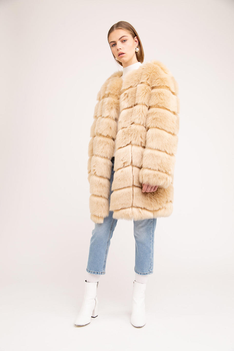 <strong><a href="https://jakke.co.uk/shop/chloe-blonde/" target="_blank" rel="noopener noreferrer">Jakke Chloe faux fur blonde coat</a>, $283.10</strong>