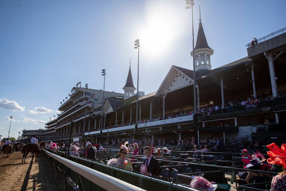 Twin spires stretch high above the reduced capacity crowd after the 147th running of the Kentucky Oaks, Friday, April 30, 2021 in Louisville, Ky.