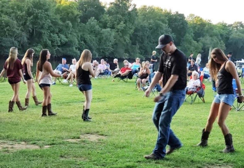 Line dancing at Country Blast at Appomattox Boat Harbor in Prince George, Va.