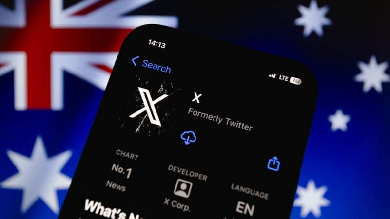 An Apple iPhone open to the App Store listing for X (formerly Twitter), against the backdrop of the Australian flag.