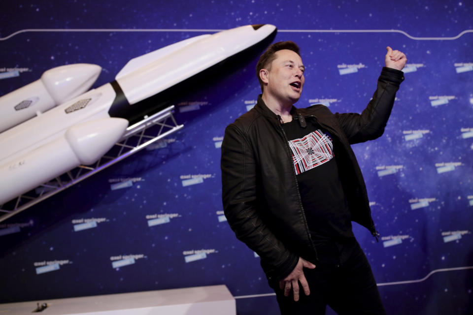 FILE - SpaceX owner and Tesla CEO Elon Musk arrives on the red carpet for the Axel Springer media award, in Berlin, Germany on Dec. 1, 2020. (Hannibal Hanschke/Pool via AP, File)