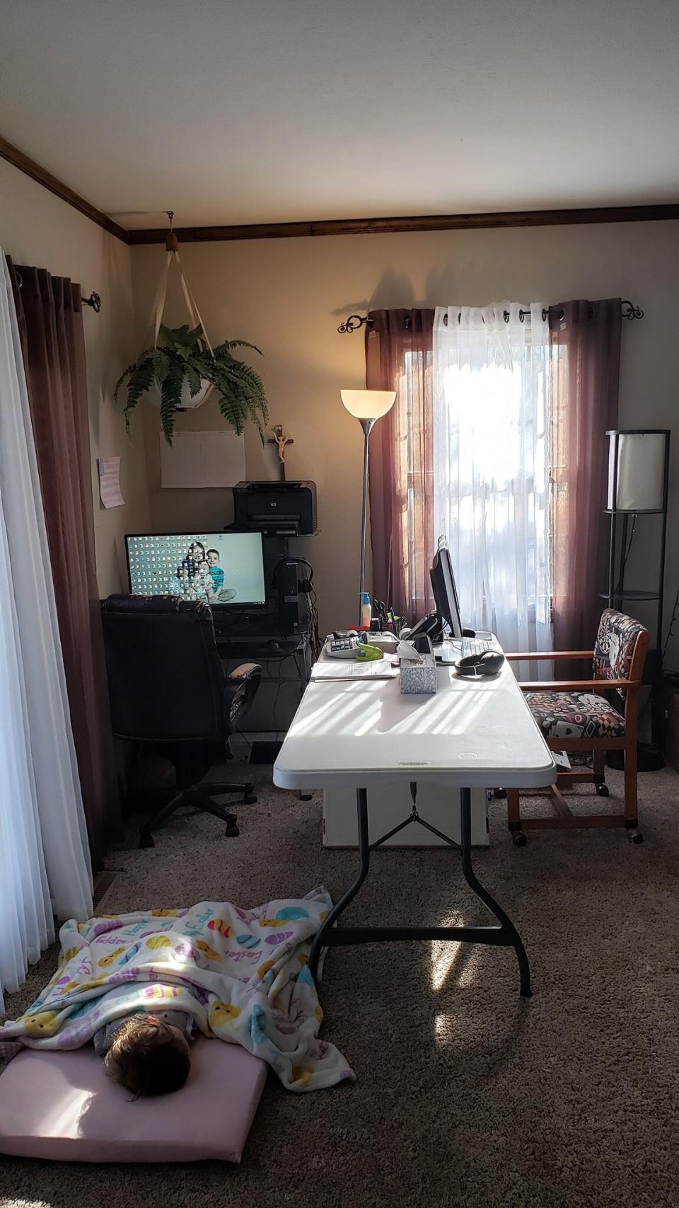 Accounting clerk Molly Lisenko brought in a six-foot folding table to accommodate her new work and schooling situation.&nbsp; (Photo: Molly Lisenko)