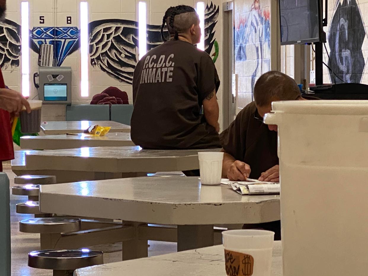 Inmates at the Pueblo County jail gather in a commons room. The Pueblo County commissioners on Tuesday approved a bid for the construction of a new jail.