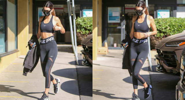 Kendall Jenner keeps it sporty in a hoodie and leggings while