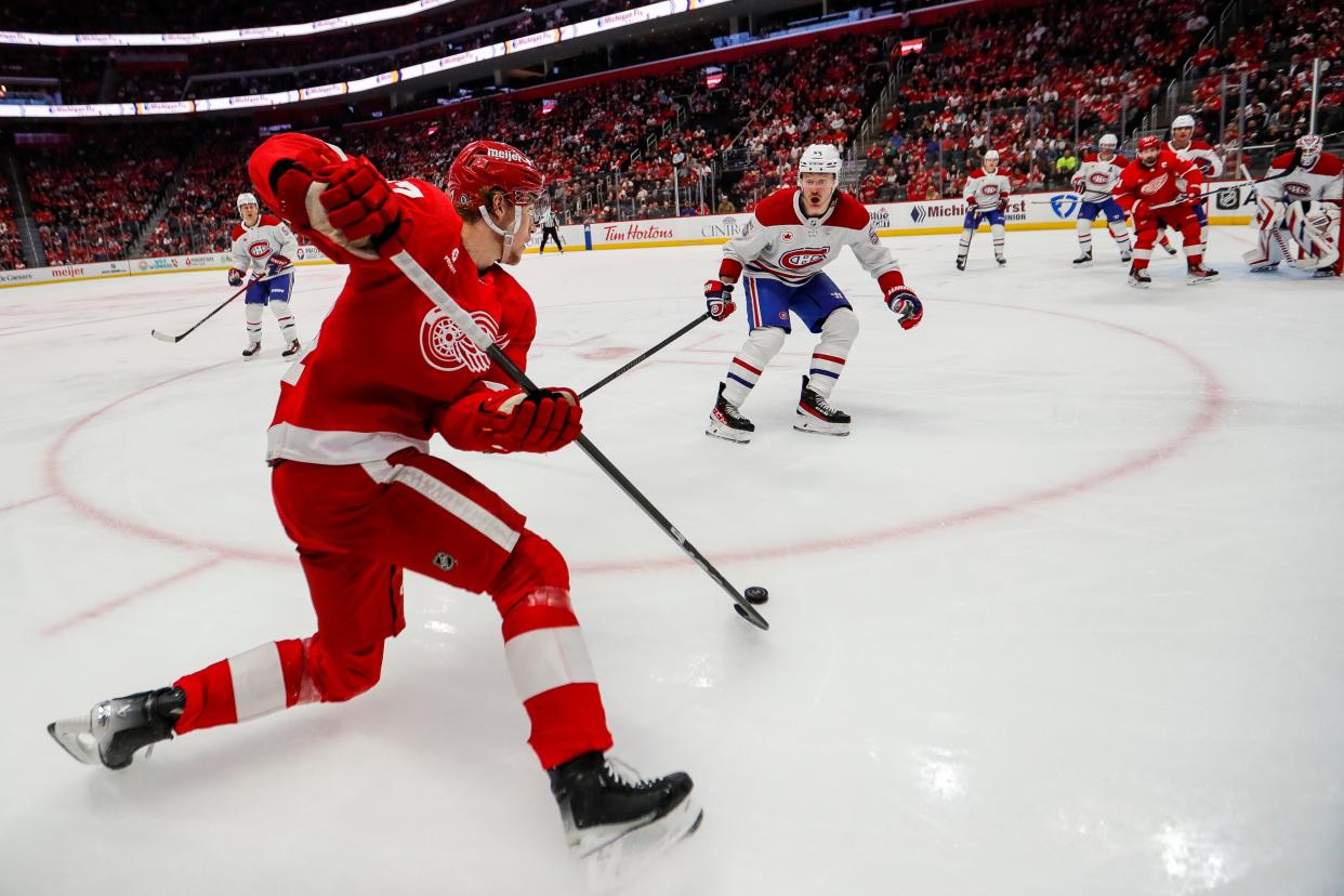 Detroit Red Wings defenseman Simon Edvinsson (77) looks to pass against Montreal Canadiens during the third period at Little Caesars Arena in Detroit on Monday, April 15, 2024.