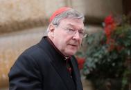 Australian Cardinal George Pell arrives for a meeting at the Synod Hall in the Vatican March 6, 2013. REUTERS/Tony Gentile