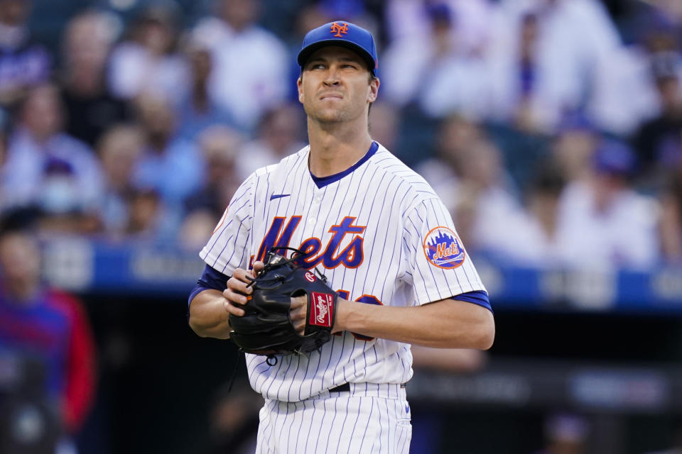 New York Mets starting pitcher Jacob deGrom reacts during the first inning of a baseball game against the Chicago Cubs Wednesday, June 16, 2021, in New York. (AP Photo/Frank Franklin II)