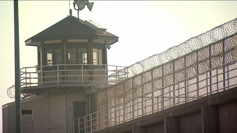 A guard tower looms above barbed wire at the Indiana State Prison in Michigan City.