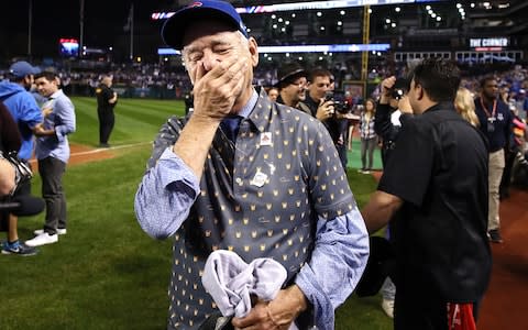  Actor Bill Murray reacts on the field after the Chicago Cubs defeated the Cleveland Indians 8-7 in Game Seven of the 2016 World Series - Credit: Getty