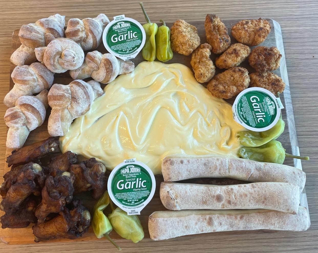 Papa Johns created a butter board with their garlic butter sauce. (Photo: Papa Johns)