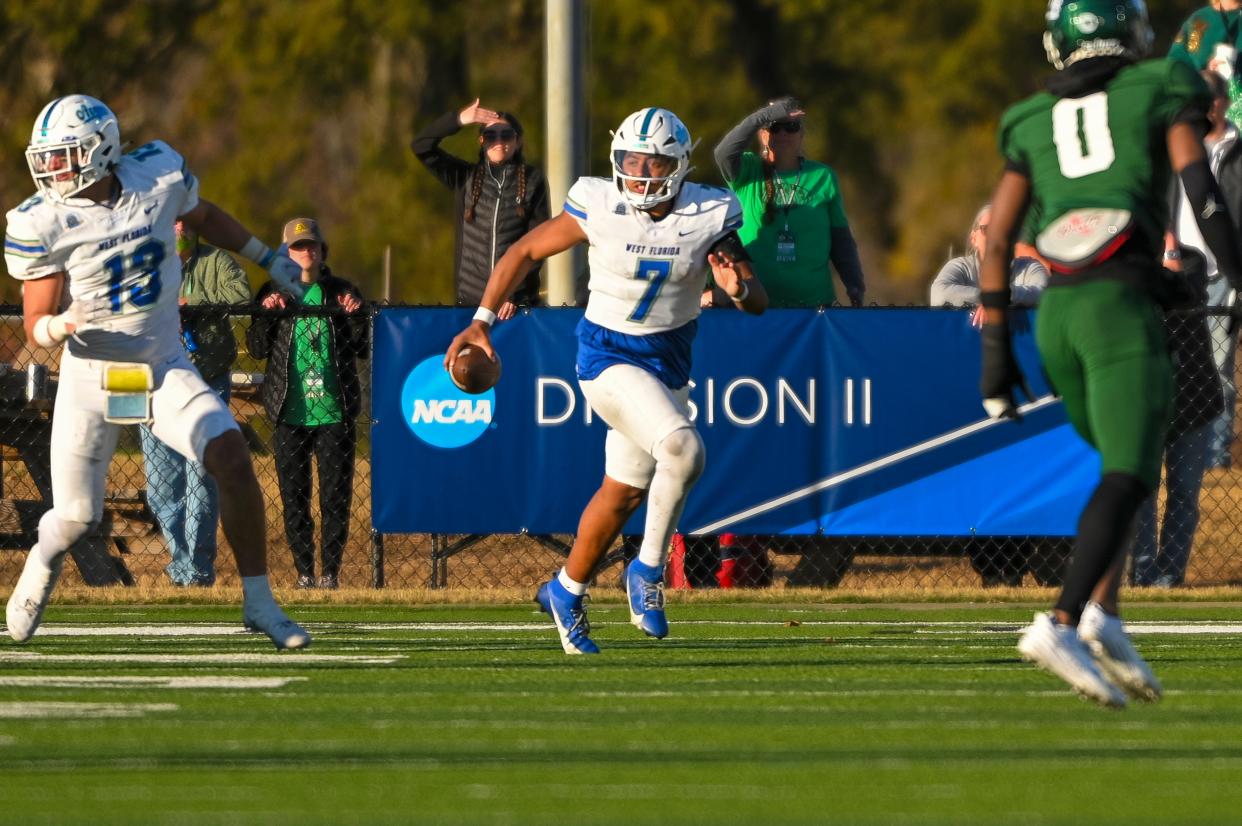 University of West Florida quarterback Peewee Jarrett (7) runs down the field in a game against Delta State in Cleveland, Mississippi, on Nov. 18, 2023.