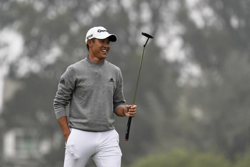 Collin Morikawa smiles after a birdie on the 16th hole during the final round of the PGA Championship golf tournament at TPC Harding Park Sunday, Aug. 9, 2020, in San Francisco. (AP Photo/Jeff Chiu)