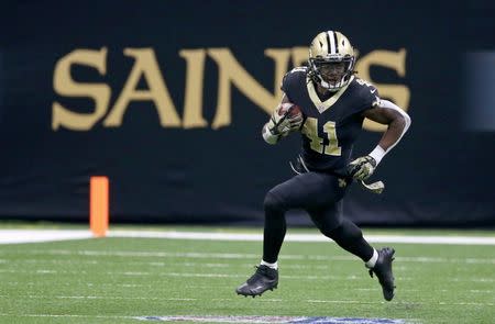 Nov 5, 2017; New Orleans, LA, USA; New Orleans Saints running back Alvin Kamara (41) runs against the Tampa Bay Buccaneers in the second half at the Mercedes-Benz Superdome. The Saints won, 30-10. Chuck Cook-USA TODAY Sports