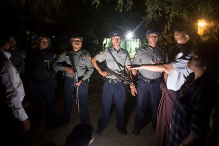 Myanmar Police stand guard at the forensic department of a hospital where the body of Ko Ni is kept, a prominent member of Myanmar's Muslim minority and legal adviser for Myanmar's ruling National League for Democracy, in Yangon, Myanmar, January 29, 2017. Picture taken January 29, 2017. REUTERS/Aung Kyaw Htet EDITORIAL USE ONLY. NO RESALES. NO ARCHIVE.