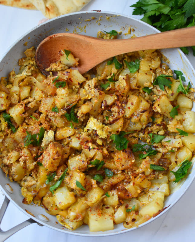 <p>A Cedar Spoon</p><p>This Lebanese Potato and Egg Recipe, also known as Batata Wa Bayd, is a wonderful holiday side dish to serve with your meal. It mixes together eggs, potatoes with onion, garlic, warm Mediterranean spices along and fresh parsley. Serve with pita bread, a dollop of Greek yogurt and hot sauce.</p><p><strong>Get the recipe: <a href="https://www.acedarspoon.com/lebanese-potato-and-egg-recipe/" rel="nofollow noopener" target="_blank" data-ylk="slk:Lebanese Potato and Egg Recipe;elm:context_link;itc:0;sec:content-canvas" class="link ">Lebanese Potato and Egg Recipe</a></strong></p><p><strong>Related: <a href="https://www.yahoo.com/lifestyle/15-best-leg-lamb-recipes-170706229.html" data-ylk="slk:Leg of Lamb Recipes for Easter;elm:context_link;itc:0;sec:content-canvas;outcm:mb_qualified_link;_E:mb_qualified_link;ct:story;" class="link  yahoo-link">Leg of Lamb Recipes for Easter</a></strong></p>