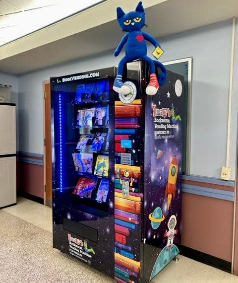 Knollwood Elementary School's new book vending machine stocked with a wide selection of books for young readers.