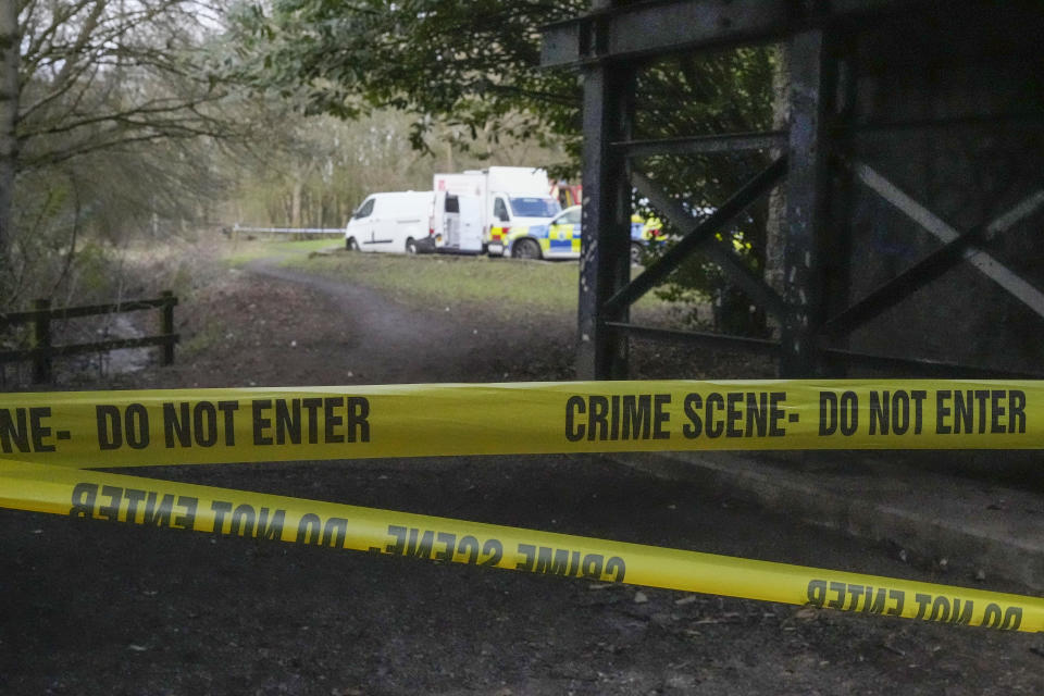 Police investigators remained at the scene in Culcheth, Cheshire, on Monday. (Getty)