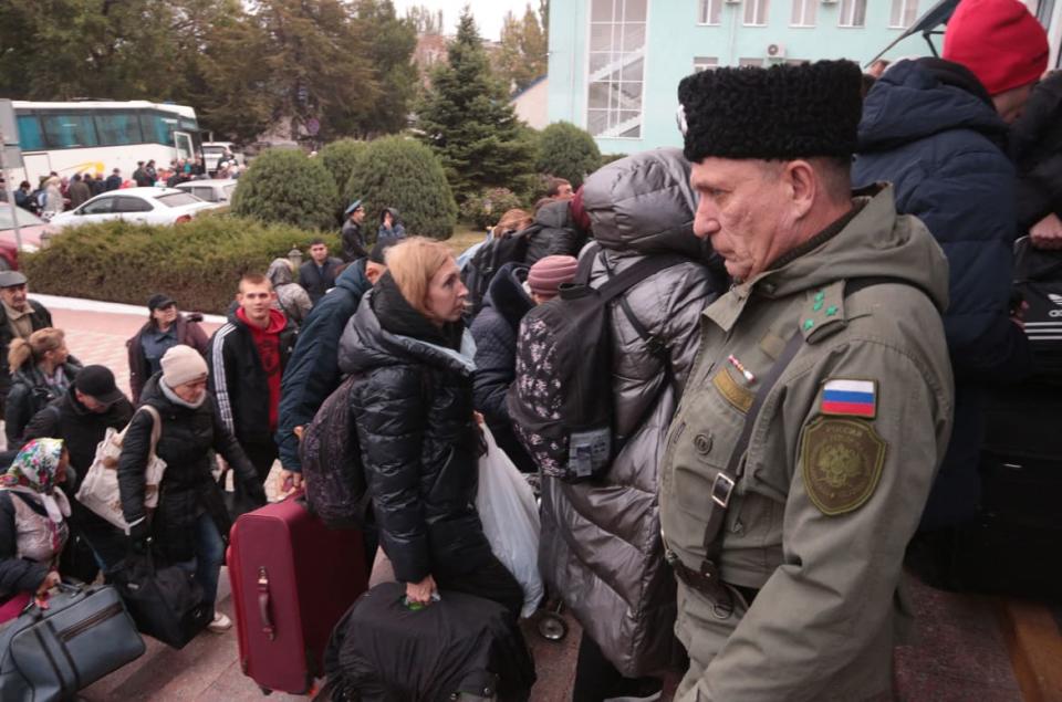 <div class="inline-image__caption"><p>People arrived from Kherson wait for further evacuation into the depths of Russia at the Dzhankoi's railway station in Crimea on October 21, 2022.</p></div> <div class="inline-image__credit">Stringer/AFP via Getty Images</div>