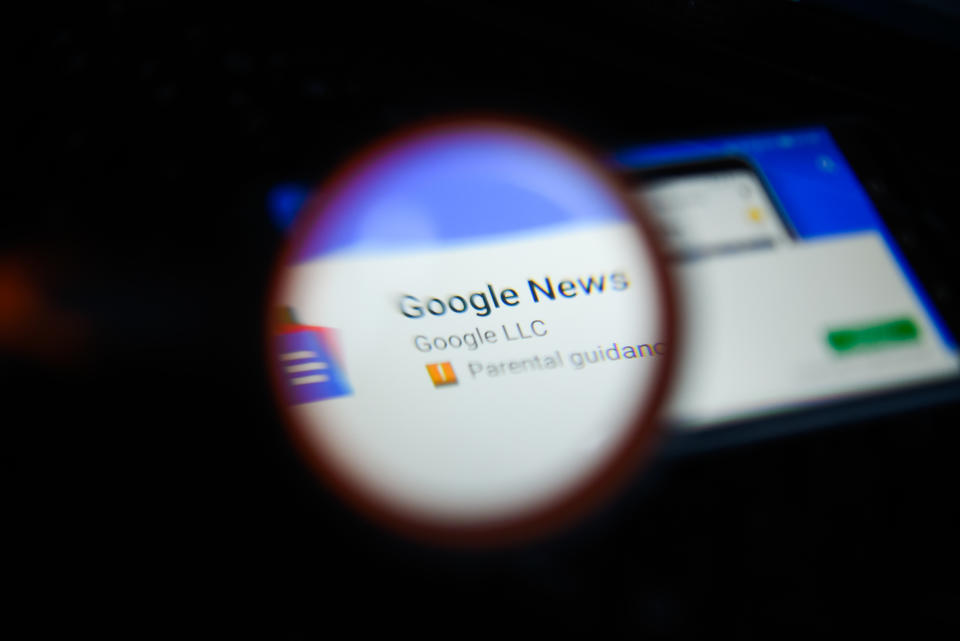 KRAKOW, POLAND - 2018/09/07:  In this photo illustration, the Google News app is seen trough a magnifying glass on an android mobile phone. (Photo Illustration by Omar Marques/SOPA Images/LightRocket via Getty Images)