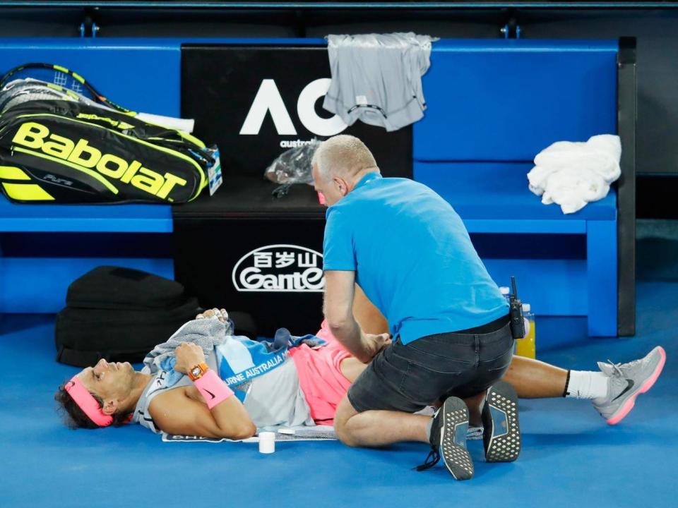Nadal was treated on court for a hip or thigh injury (Getty Images)